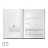 Open book with text on a white background